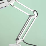 The magnifying lamp with the clamping distance up to 7.2cm, you could use in the thick desk 